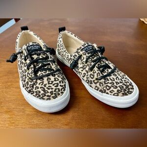 Sperry leopard print tennis shoes.
